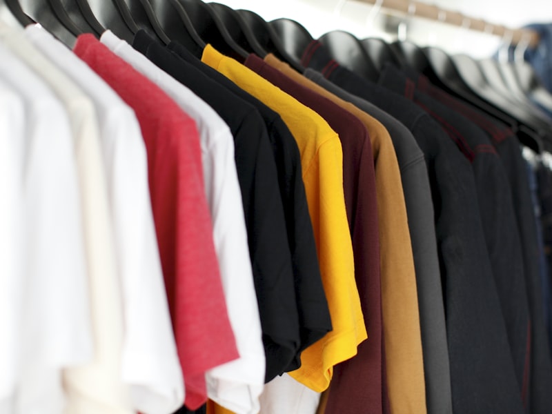 Pressed shirts hanging on a garment rail
